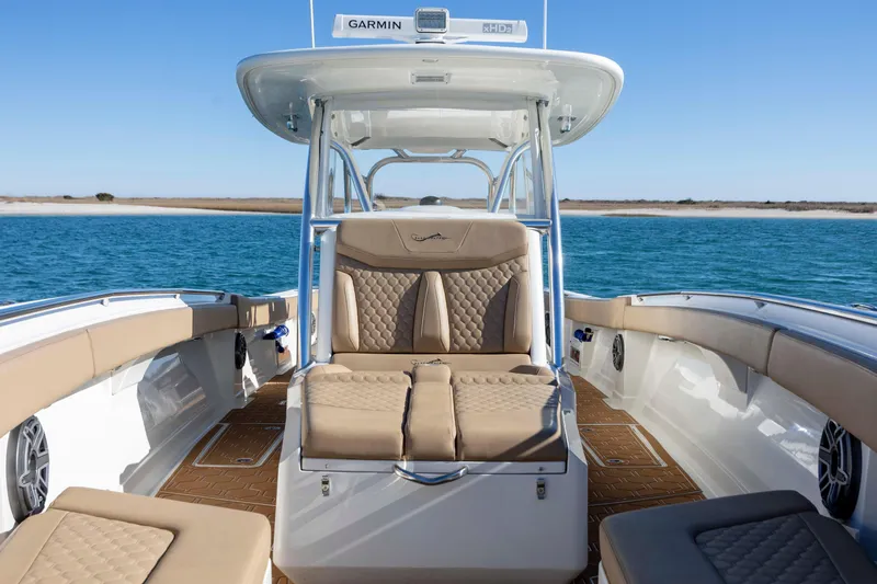  Yacht Photos Pics Luxury seating on a 2020 Blackwater 41 Tournament boat, cruising in clear blue waters.
