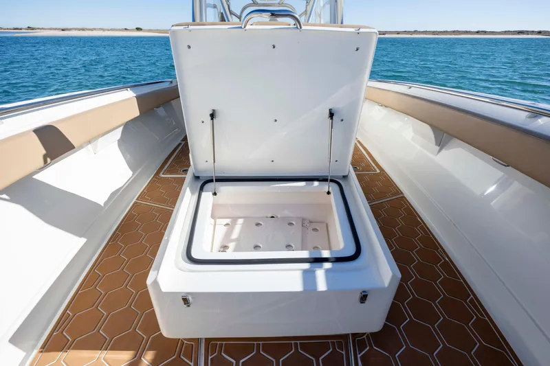  Yacht Photos Pics Open storage compartment on 2020 Blackwater 41 Tournament boat, featuring hexagonal deck pattern.