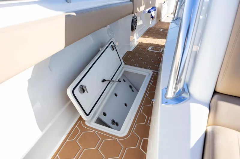  Yacht Photos Pics 2020 Blackwater 41 Tournament boat interior with open storage compartment and hexagonal flooring.