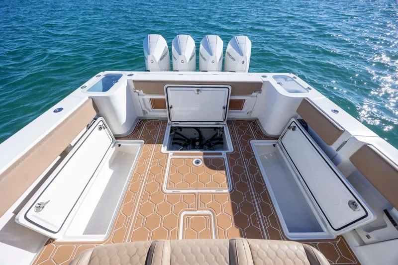  Yacht Photos Pics 2020 Blackwater 41 Tournament boat deck with storage compartments and four outboard engines.
