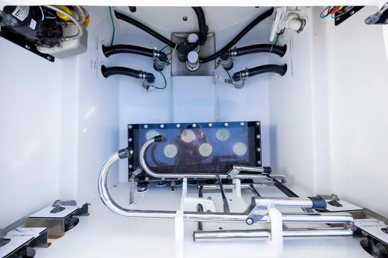  Yacht Photos Pics Interior view of 2020 Blackwater 41 Tournament boat's engine compartment with hoses and fittings.