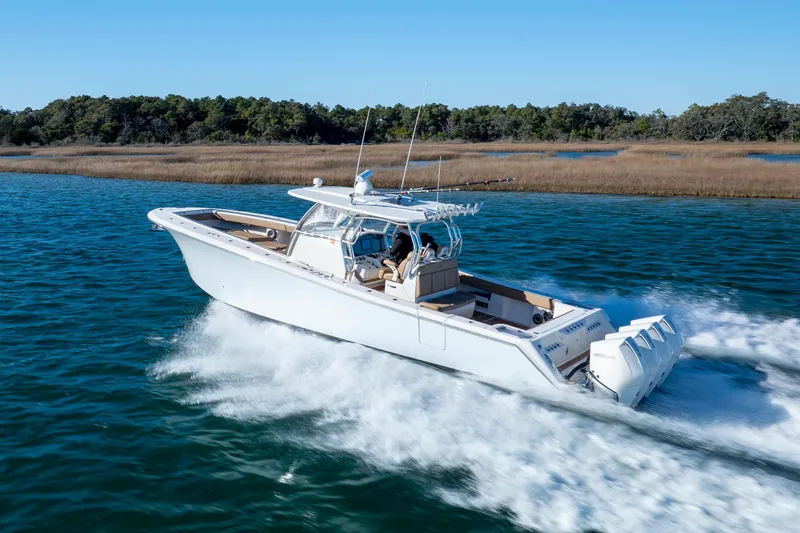  Yacht Photos Pics 2020 Blackwater 41 Tournament boat cruising on a scenic waterway.