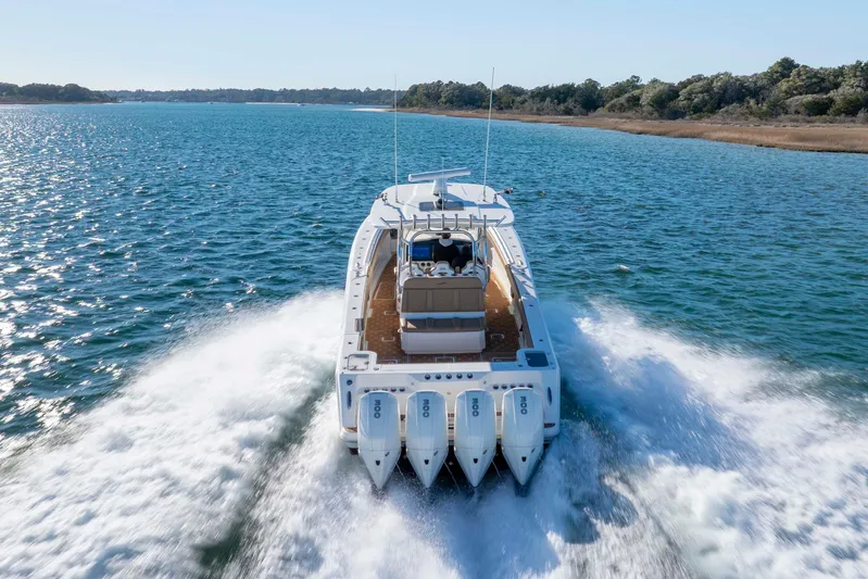  Yacht Photos Pics 2020 Blackwater 41 Tournament boat cruising on open water, rear view.