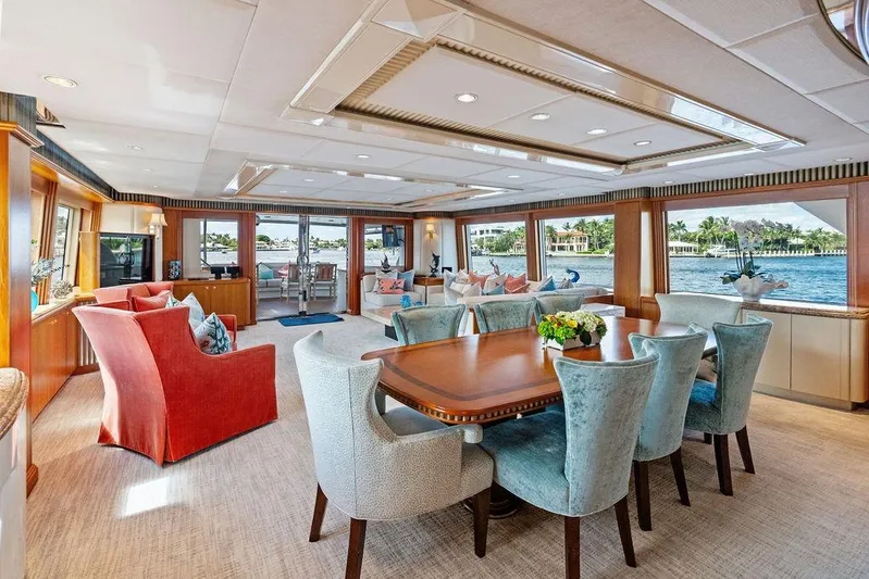 Picosa Lady Yacht Photos Pics Luxurious interior of 2001 West Bay 103 Sonship yacht with elegant dining and seating areas.