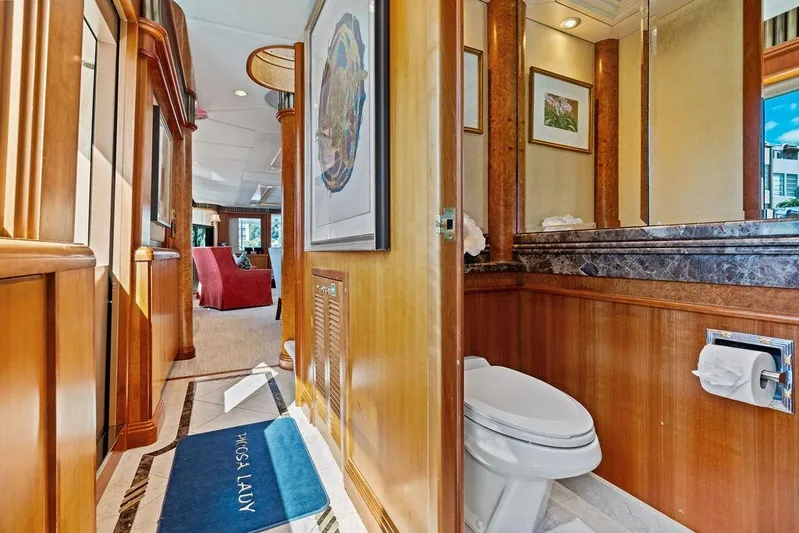 Picosa Lady Yacht Photos Pics Luxurious 2001 West Bay 103 Sonship yacht interior with elegant wood finishes and modern amenities.