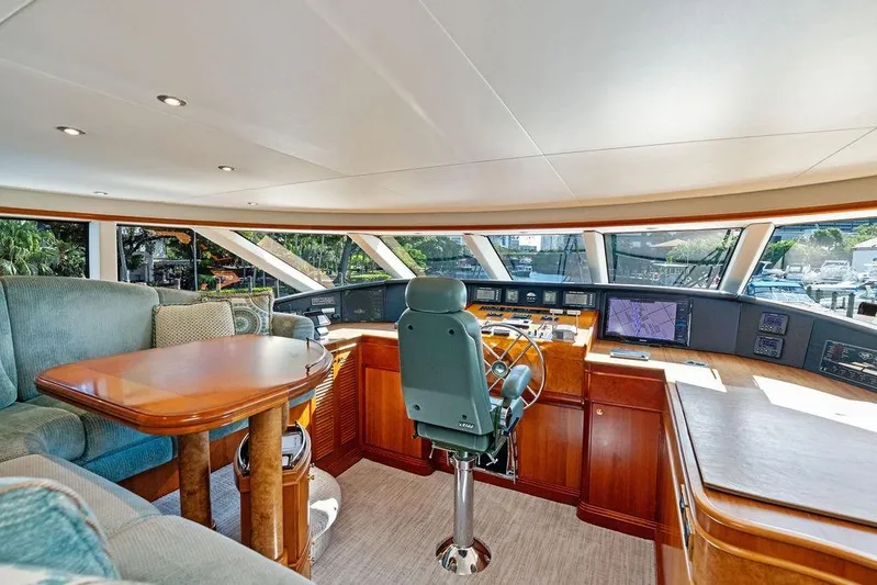 Picosa Lady Yacht Photos Pics Luxurious interior of 2001 West Bay 103 Sonship yacht with helm and seating area.