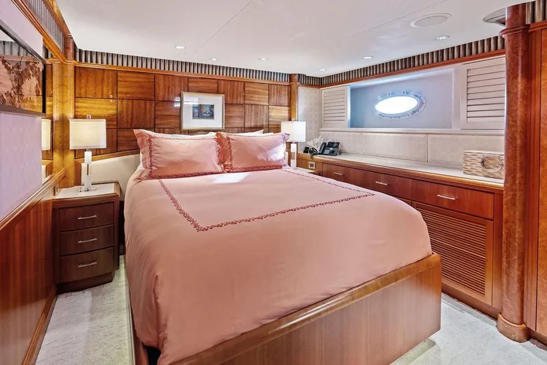 Picosa Lady Yacht Photos Pics Luxurious bedroom interior on 2001 West Bay 103 Sonship yacht with elegant wood paneling.