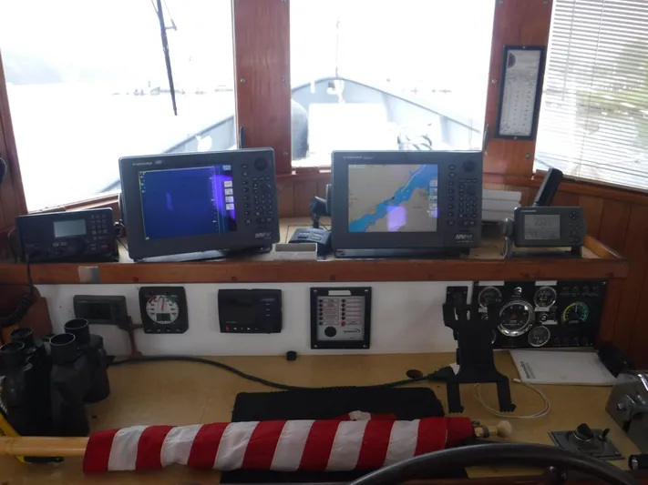" Loon Point " Yacht Photos Pics 1986 Custom 48 Trawler helm with navigation equipment and controls.