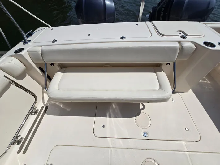  Yacht Photos Pics 2017 Grady-White Freedom 335 boat interior with foldable seating and dual engines.