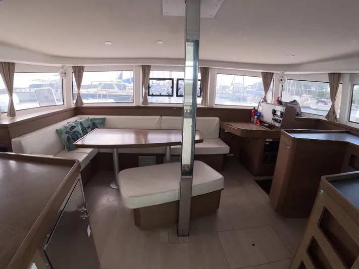 Oceanfront Yacht Photos Pics Interior of 2019 Lagoon 42 catamaran with spacious seating and modern design.