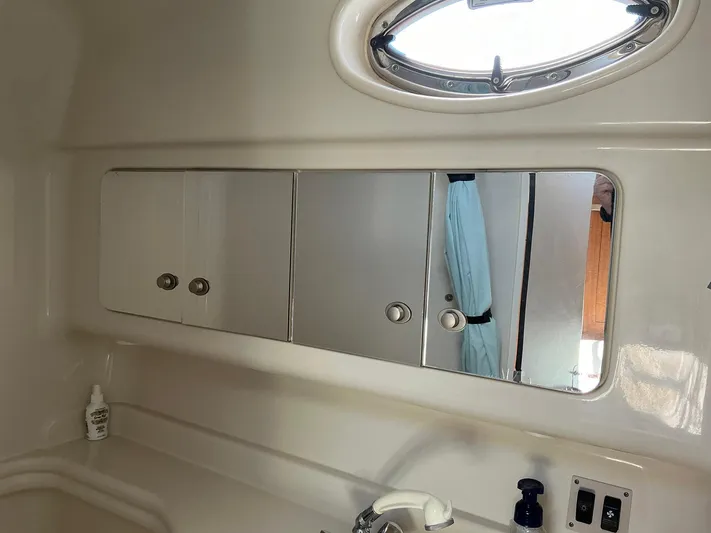 Sapphire N Rhythm Yacht Photos Pics Bathroom mirror and cabinet in 2006 Sea Ray 340 Sundancer yacht.