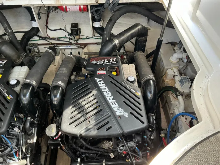 Sapphire N Rhythm Yacht Photos Pics Engine compartment of a 2006 Sea Ray 340 Sundancer with Mercury 5.0 engines.