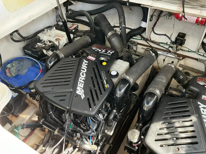 Sapphire N Rhythm Yacht Photos Pics Engine compartment of a 2006 Sea Ray 340 Sundancer with Mercury engines.