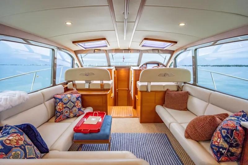 Date Night Yacht Photos Pics Luxurious interior of 2020 Palm Beach Motor Yachts PB50 with elegant seating and scenic ocean views.