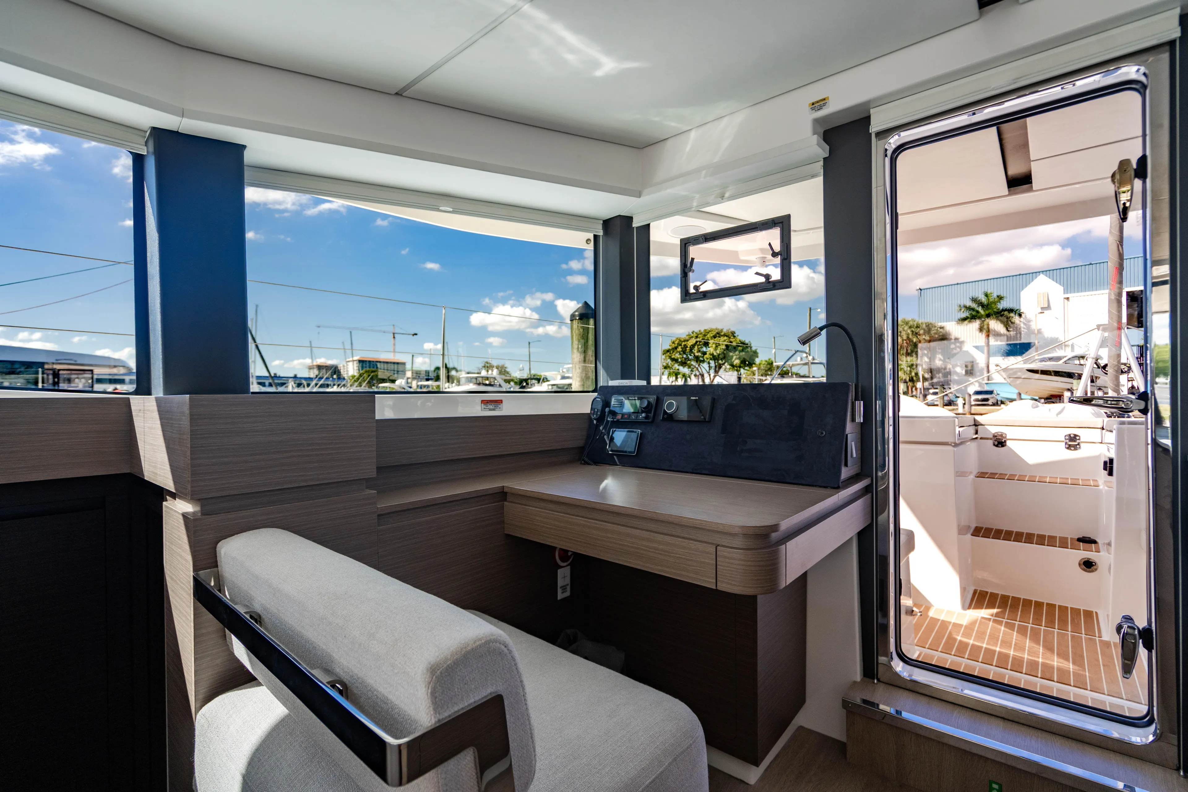 C1022 Yacht Photos Pics Interior of 2025 Leopard 46 yacht with modern design and outdoor view.