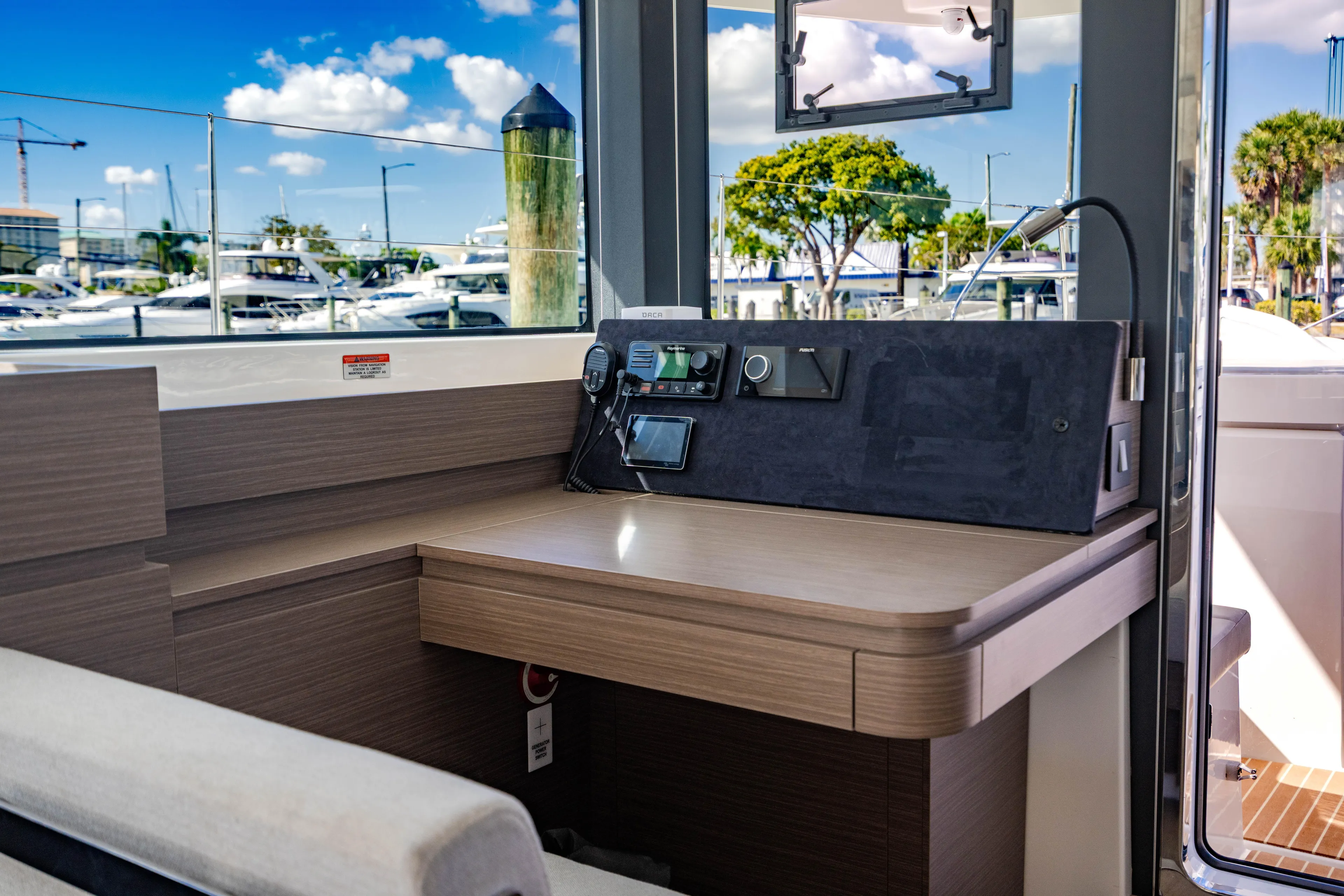 C1022 Yacht Photos Pics Modern Leopard 46 yacht interior with navigation controls, docked at marina, 2025 model.