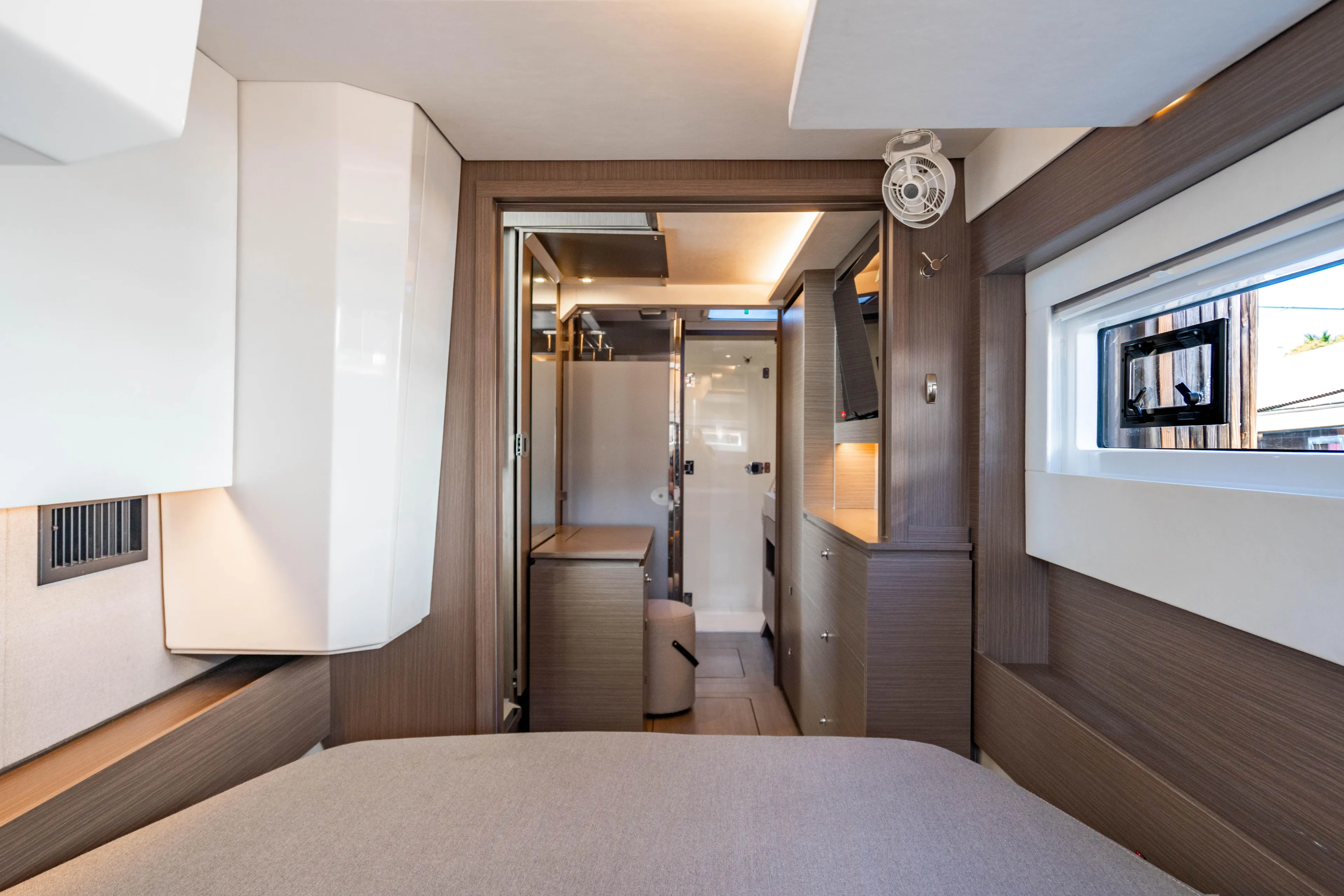 C1022 Yacht Photos Pics Luxurious interior of 2025 Leopard 46 yacht, featuring modern design and elegant wood finishes.