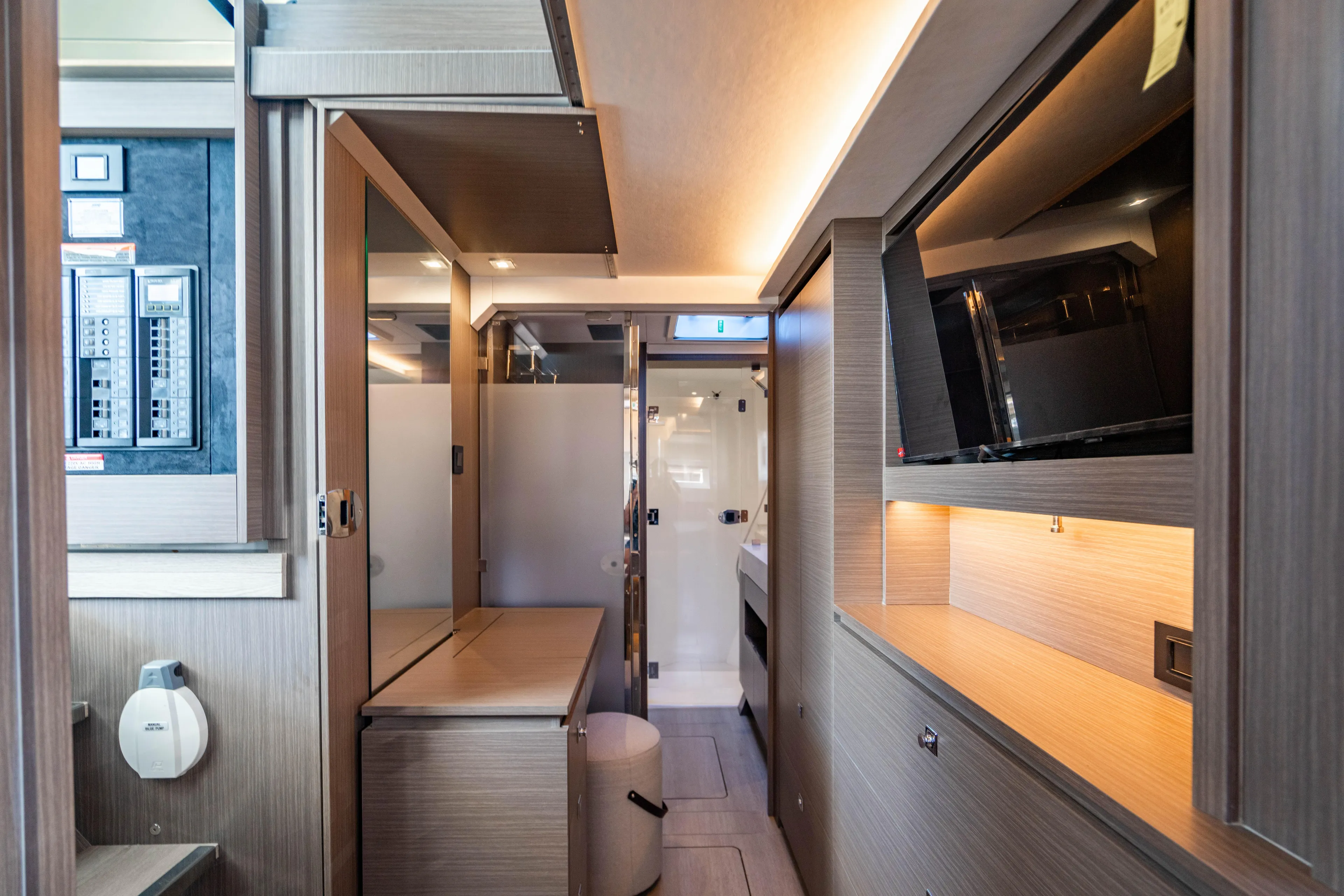 C1022 Yacht Photos Pics Modern interior of 2025 Leopard 46 yacht, featuring sleek wood finishes and integrated technology.