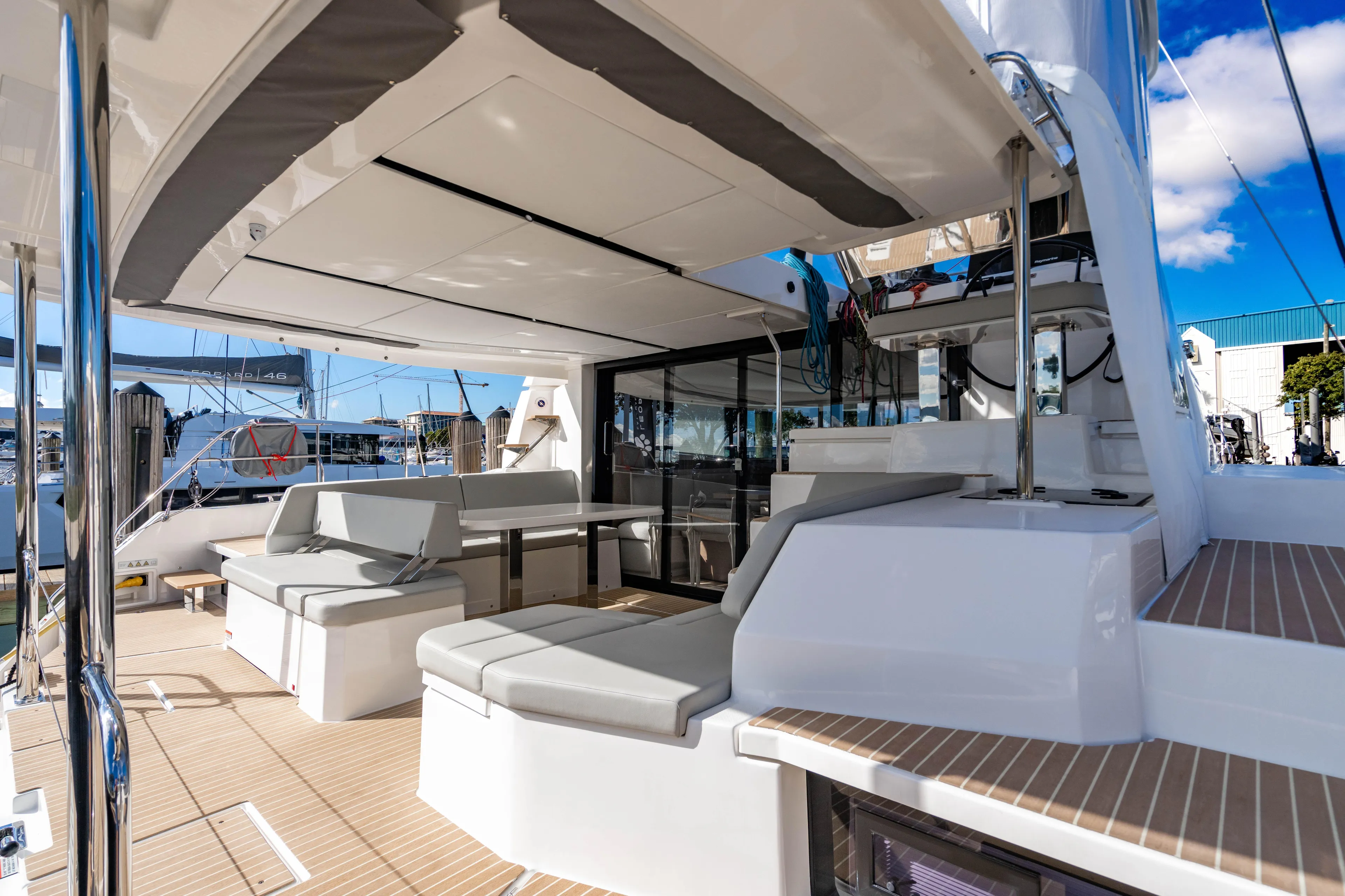 C1022 Yacht Photos Pics Luxurious 2025 Leopard 46 yacht interior with modern seating and sleek design.