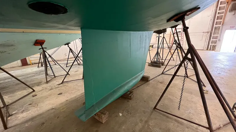 Nala Yacht Photos Pics Lyman-Morse Sparkman & Stephens Sloop 2004 in dry dock, showing keel and supports.