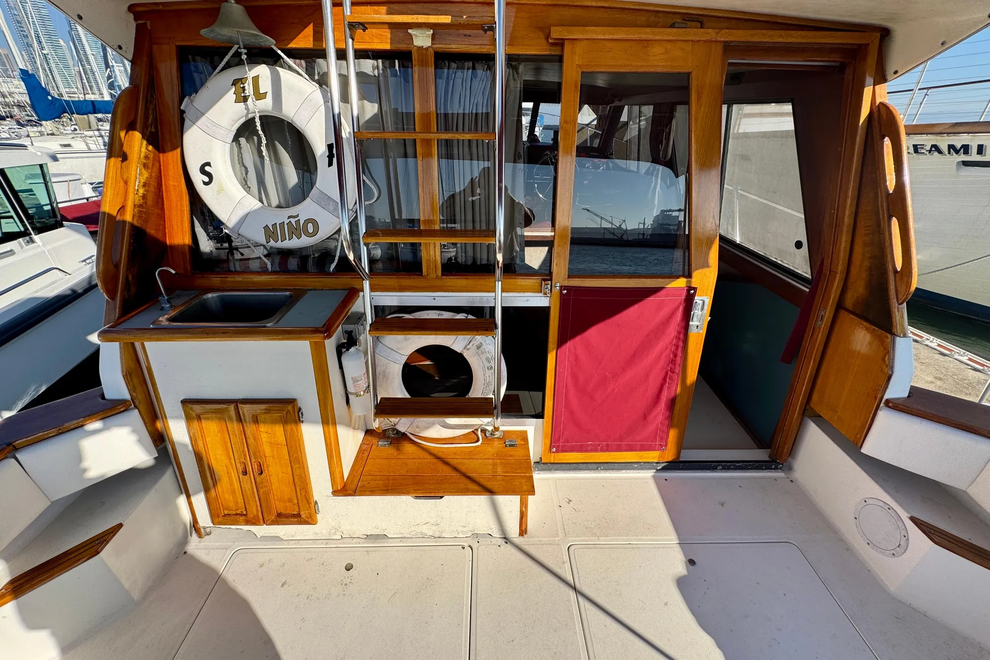 1989 Bayliner 3288 Motoryacht interior with wooden accents and nautical decor.