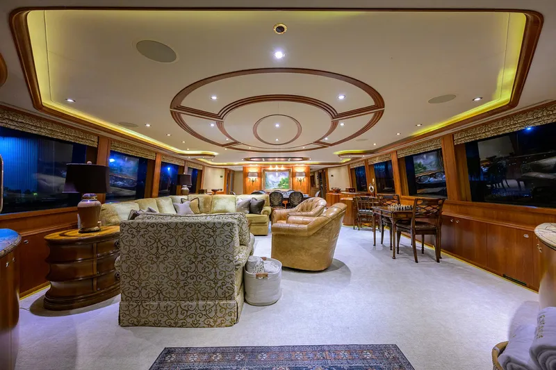 Exodus Yacht Photos Pics Luxurious interior of a 2008 Westport 112 yacht with elegant seating and ambient lighting.