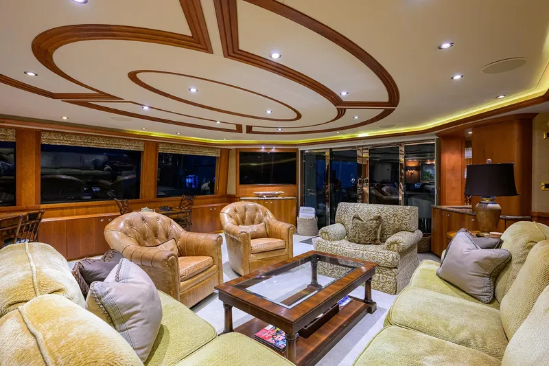 Exodus Yacht Photos Pics Luxurious interior of 2008 Westport 112 yacht with elegant seating and wooden accents.