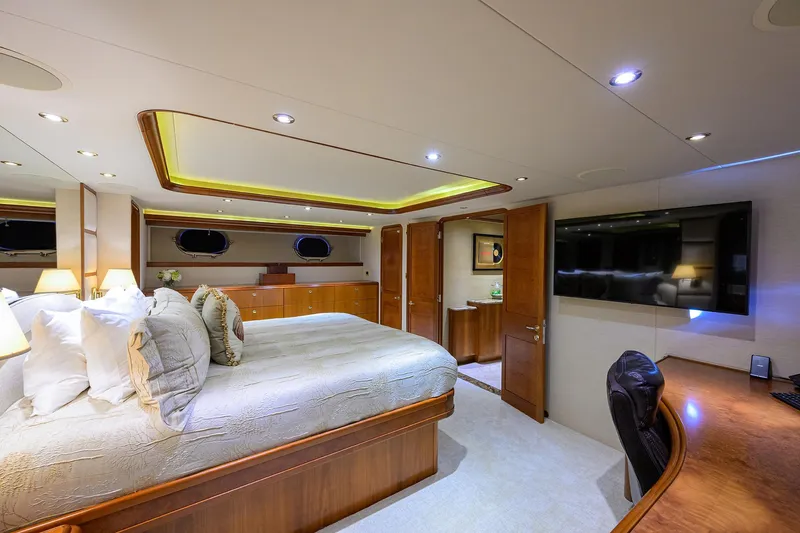 Exodus Yacht Photos Pics Luxurious bedroom interior of 2008 Westport 112 yacht with modern amenities.