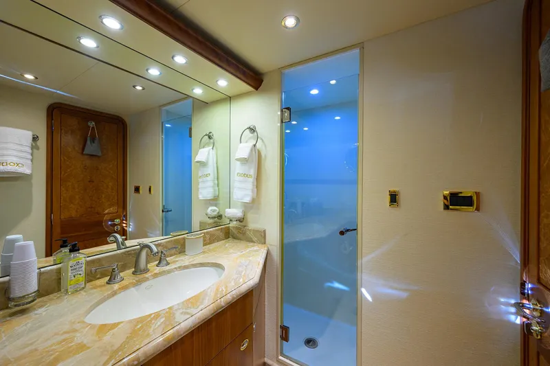 Exodus Yacht Photos Pics Luxurious bathroom in 2008 Westport 112 yacht with marble countertop and glass shower.