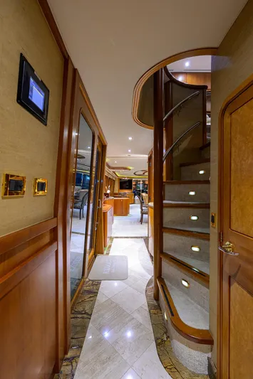 Exodus Yacht Photos Pics Luxurious interior of 2008 Westport 112 yacht with elegant staircase and modern design.