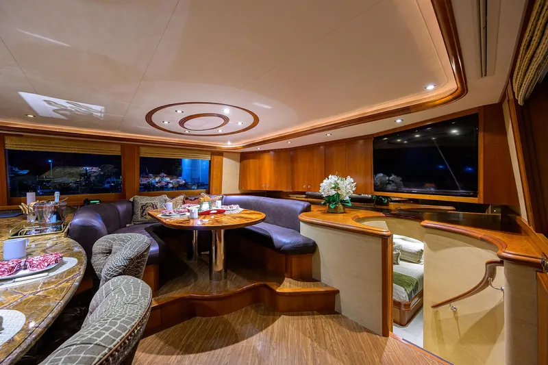 Exodus Yacht Photos Pics Luxurious interior of 2008 Westport 112 yacht with elegant dining area and wood finishes.