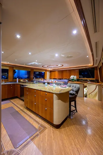 Exodus Yacht Photos Pics Luxurious interior of 2008 Westport 112 yacht with elegant wood finishes and modern lighting.