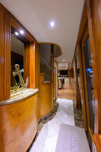 Exodus Yacht Photos Pics Luxurious interior hallway of 2008 Westport 112 yacht with elegant wood finishes.