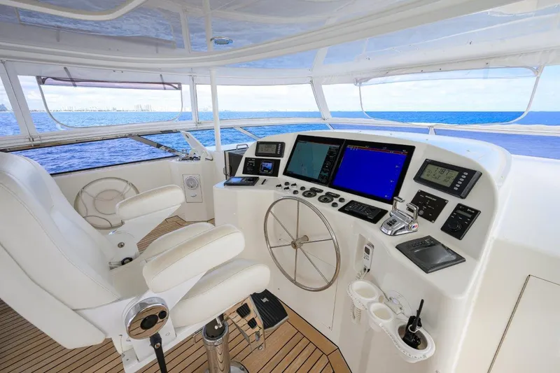 Exodus Yacht Photos Pics Luxurious 2008 Westport 112 yacht helm with ocean view and advanced navigation systems.