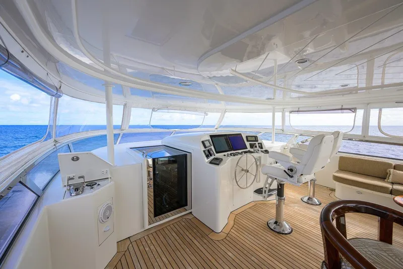 Exodus Yacht Photos Pics Luxurious 2008 Westport 112 yacht helm with ocean view and modern controls.
