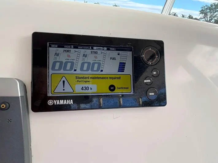  Yacht Photos Pics Yamaha engine display on 2012 Edgewater 318CC showing maintenance alert.