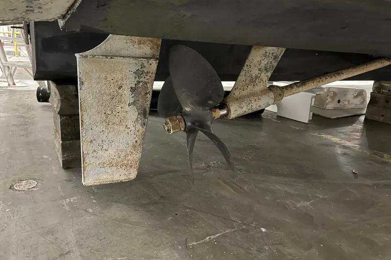  Yacht Photos Pics Propeller and rudder of 2001 Sea Ray Sundancer 460 on dry dock.