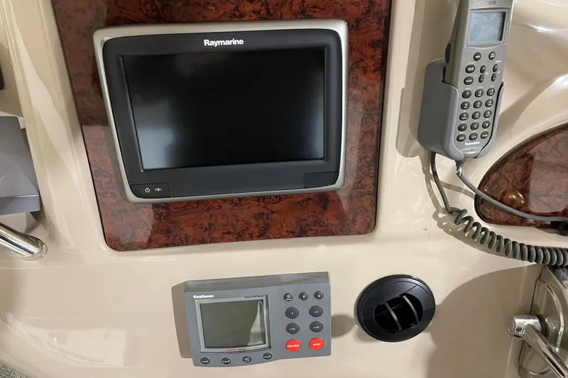 Yacht Photos Pics Control panel of a 2001 Sea Ray Sundancer 460 with Raymarine electronics.