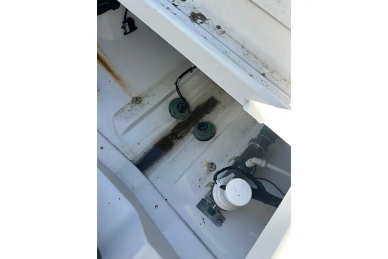  Yacht Photos Pics 2020 Everglades 335 Center Console boat interior compartment with visible wiring and components.