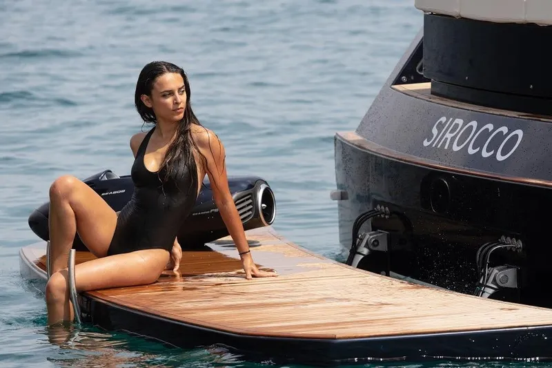 Sirocco Yacht Photos Pics Woman in swimsuit on Pardo Yachts 43, 2021 model, enjoying the water.