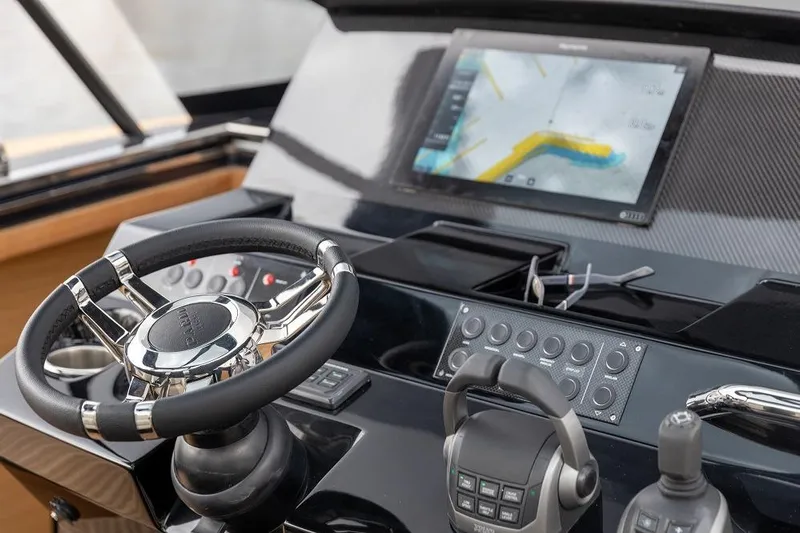 Sirocco Yacht Photos Pics Cockpit of 2021 Pardo Yachts 43 with steering wheel and navigation display.