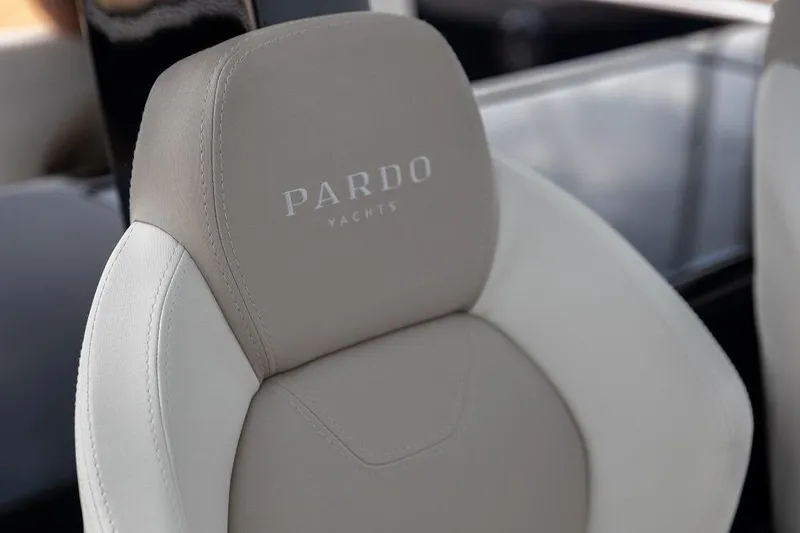 Sirocco Yacht Photos Pics Luxurious seating on 2021 Pardo Yachts 43, featuring elegant design and branding.