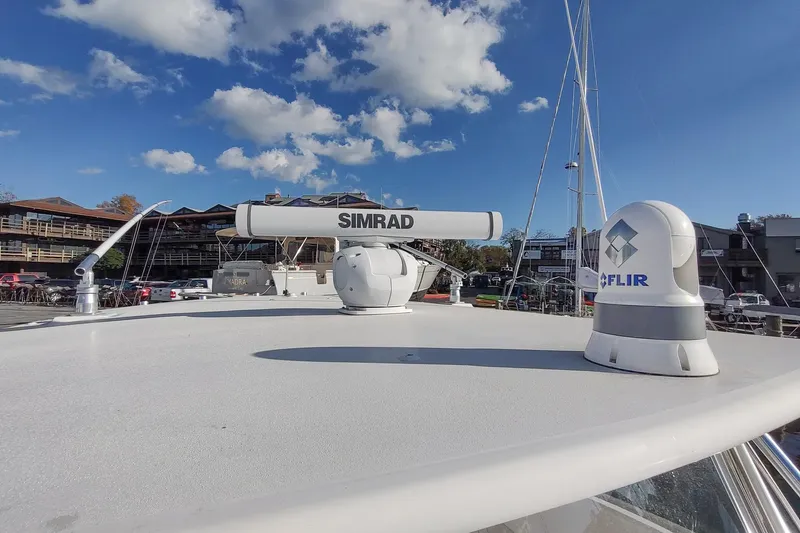 Never Enough Yacht Photos Pics 2017 Out Island SeaTek 36 Express boat with Simrad and FLIR equipment on deck.