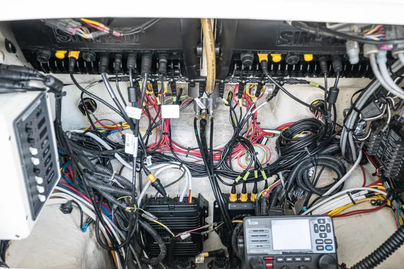 Never Enough Yacht Photos Pics Electrical wiring and equipment inside a 2017 Out Island SeaTek 36 Express boat.