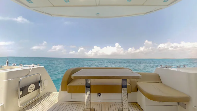  Yacht Photos Pics Luxury Monte Carlo Yachts MC5 2016 deck with ocean view and seating area.