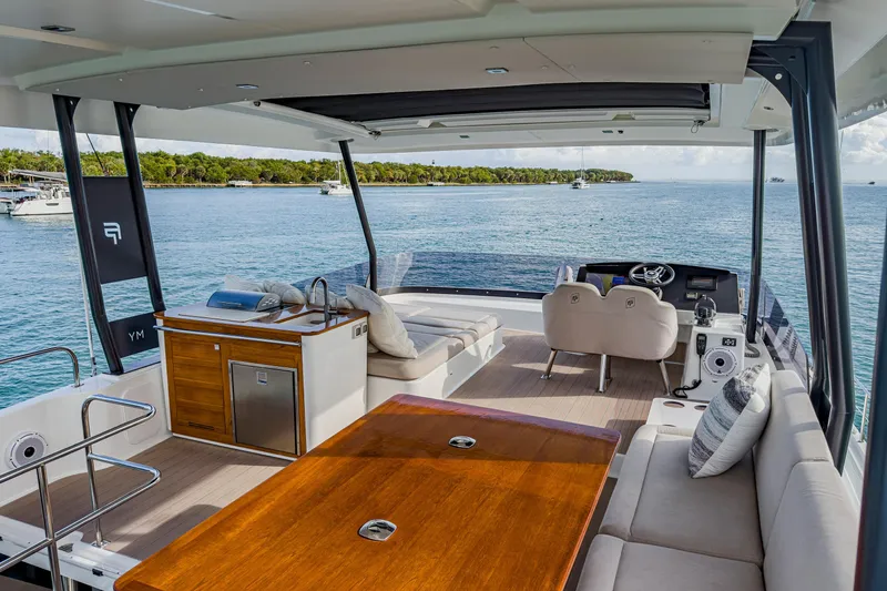 Hawkeye Yacht Photos Pics Luxurious 2022 Fountaine Pajot MY6 yacht interior with scenic ocean view.