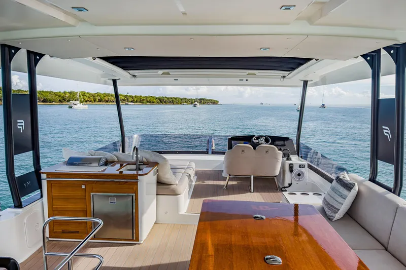 Hawkeye Yacht Photos Pics Luxurious 2022 Fountaine Pajot MY6 yacht interior with ocean view and modern amenities.