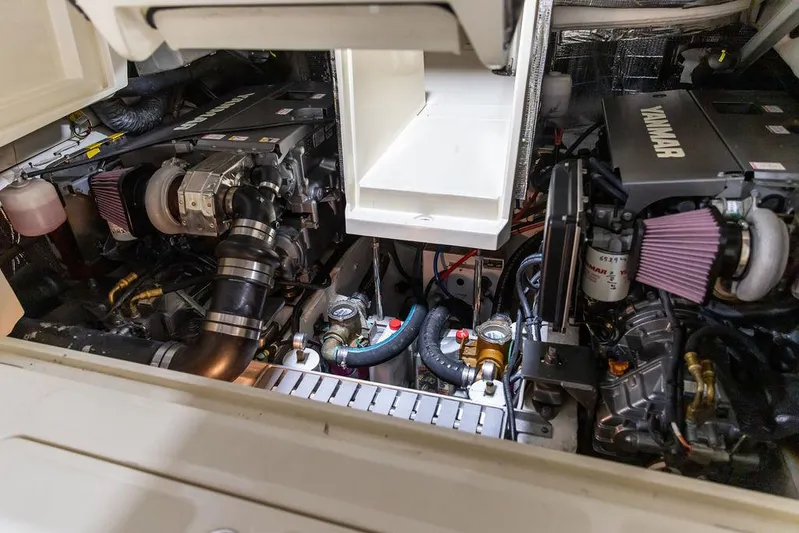 Valor Yacht Photos Pics Engine compartment of a 2014 Hinckley Talaria 34, featuring dual Yanmar engines.