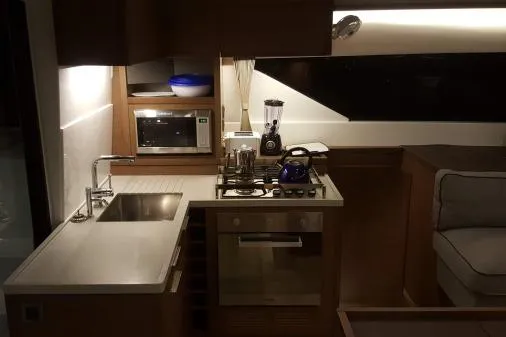 Lone Star Lagoon Yacht Photos Pics Modern kitchen interior of 2019 Lagoon 50 yacht with appliances and sleek design.