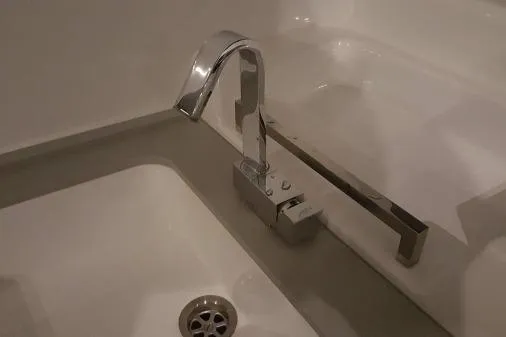 Lone Star Lagoon Yacht Photos Pics Modern chrome faucet in a Lagoon 50 yacht's bathroom, 2019 model.